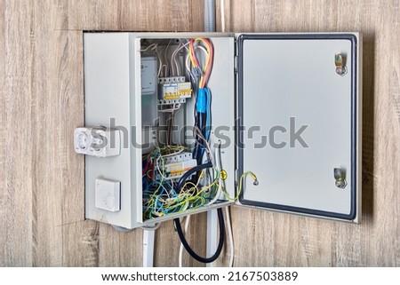 Power supply box with fuses and electric meter.