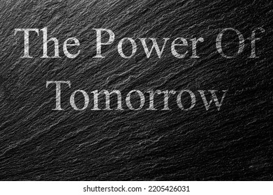 The Power Of Tomorrow Chalk Text On Black Stone Slab