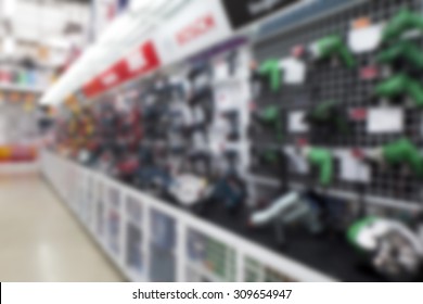 Power Tools Aisle In Hardware Store, Blurred Image