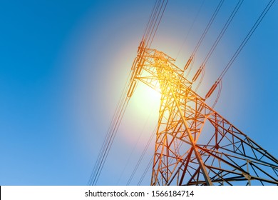 Power Transmission Line With Sun Light For Background