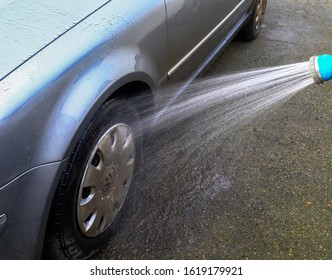 Power Washing Car With VW Wheel Trims. North Wales, UK, 5th January 2020. 