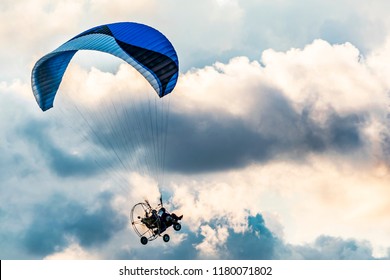 Powered parachute in the clouds