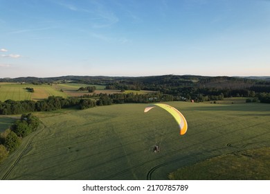 powered paragliding with paramotor aerial scenic panorama view of beautiful sunny sumer landscape in Czech republic,Europe