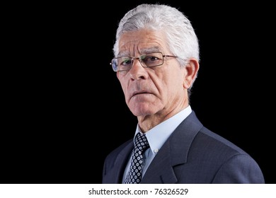 Powerful businessman portrait (isolated on black)