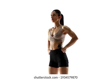 Powerful. Caucasian Professional Female Athlete Training Isolated On White Studio Background. Muscular, Sportive Woman. Concept Of Action, Motion, Youth, Healthy Lifestyle. Copyspace For Ad.