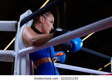 Powerful Charged Girl Stands In The Corner Of The Ring And Is Ready To Explode In The Next Round. The Concept Of Wrestling And Boxing. Mixed Media