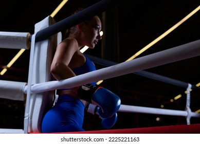 Powerful Charged Girl Stands In The Corner Of The Ring And Is Ready To Explode In The Next Round. The Concept Of Wrestling And Boxing. Mixed Media