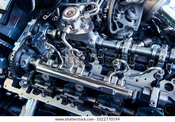 The powerful engine of\
a car. Internal design of engine. Car engine part. Modern powerful\
car engine.