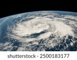 A powerful hurricane swirling over the Earth