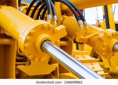 Powerful hydraulic cylinders. The main power and driving element for construction equipment.