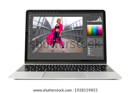Powerful laptop computer isolated on white background. Sample graphic editor's interface is completely made up.