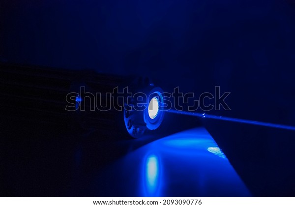 Powerful laser pointer,\
blue laser capable of burning paper and leaving burns, modern laser\
technology