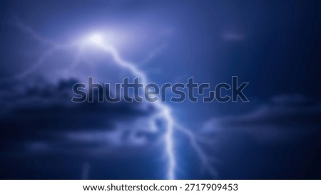 A powerful lightning bolt cuts through the dark, ominous sky during a thunderstorm.