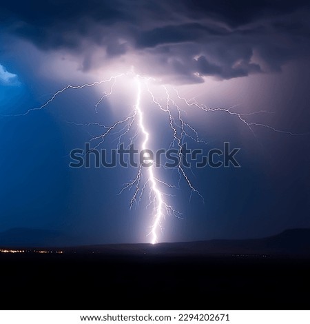 Powerful lightning flash illuminates the night sky during a thunderstorm, shallow depth of field,