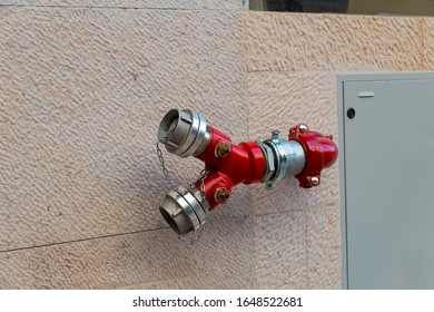 powerful modern hydrant to extinguish a fire on the streets of Lisbon