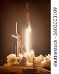 A powerful rocket soars through golden clouds, leaving a trail of fiery ambition and boundless exploration. ,  . Rocket liftoff. Elements of this image furnished by NASA