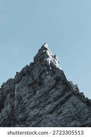 Powerful sharp pointed mountain peak 