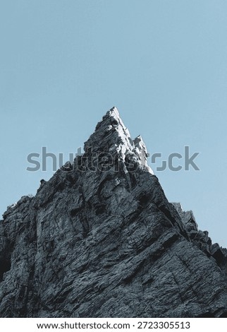 Powerful sharp pointed mountain peak 