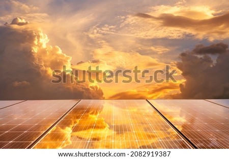 The powerful sky reflected on the solar panels.