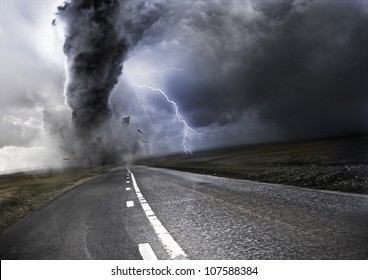 Powerful Tornado - destroying property with lightning in the background - Shutterstock ID 107588384