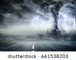 Powerful Tornado On Road In Stormy Landscape
