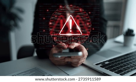 A powerful warning symbol overlaying binary code in a modern office setting highlights cybersecurity issues, emphasizing the need for digital safety and awareness in business environments. Gantry