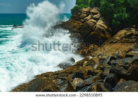 Powerful waves crash on the rocky shore