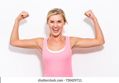 Powerful young fit woman on a white background - Powered by Shutterstock