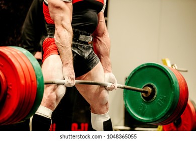 powerlifter heavy weight barbell exercise deadlift in powerlifting 