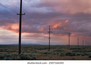 Powerlines with stormy sunset Wyoming