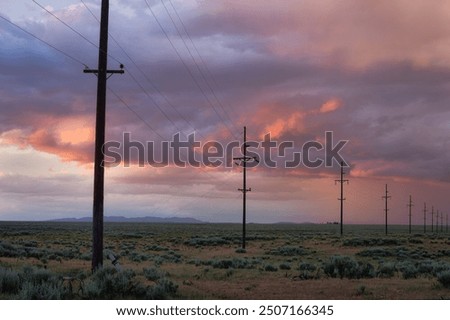 Powerlines with stormy sunset Wyoming