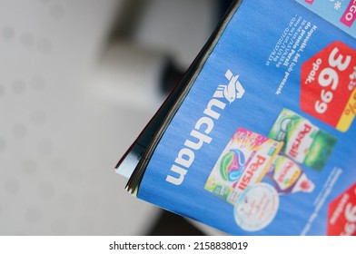 POZAN, POLAND - Feb 16, 2022: A Closeup Of An Auchan Supermarket Brochure Page 