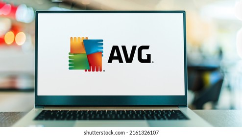 POZNAN, POL - APR 7, 2022: Laptop computer displaying logo of AVG AntiVirus, a line of antivirus software developed by AVG Technologies, a subsidiary of Avast