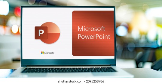 POZNAN, POL - DEC 12, 2021: Laptop computer displaying logo of Microsoft PowerPoint, a presentation program, part of the Office family software and services developed by Microsoft