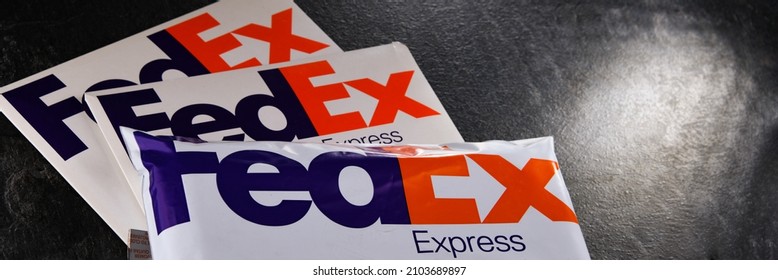 POZNAN, POL - DEC 26, 2021: Envelopes of FedEx, an American multinational courier delivery services company headquartered in Memphis, Tennessee.
