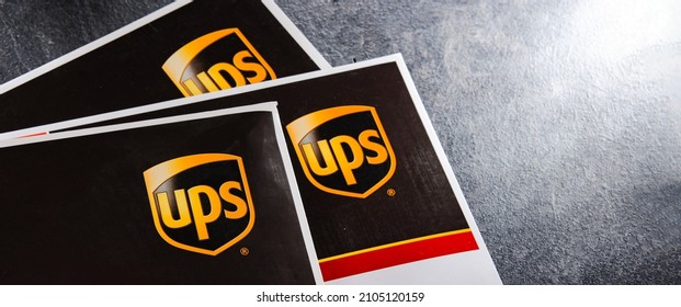 POZNAN, POL - DEC 26, 2021: Envelopes of United Parcel Service or UPS, the world's largest package delivery company, shipping over 15 million packages per day in more than 220 countries