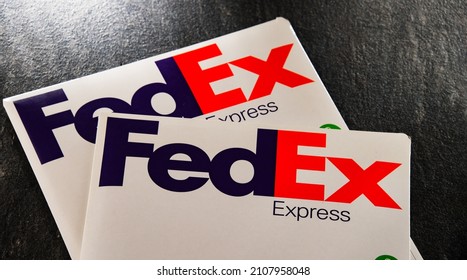 POZNAN, POL - DEC 26, 2021: Envelopes of FedEx, an American multinational courier delivery services company headquartered in Memphis, Tennessee.