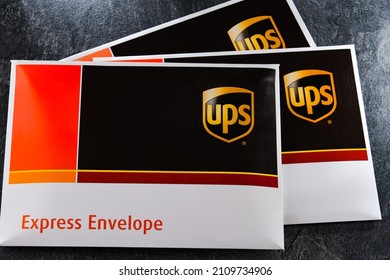 POZNAN, POL - DEC 26, 2021: Envelopes of United Parcel Service or UPS, the world's largest package delivery company, shipping over 15 million packages per day in more than 220 countries