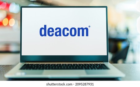 POZNAN, POL - DEC 8, 2021: Laptop computer displaying logo of Deacom, an ERP software producer for mid-to-large sized manufacturing and distribution companies
