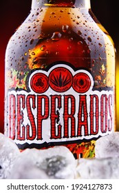 POZNAN, POL - FEB 18, 2021: Bottle of Desperados pale lager flavored with tequila, a popular beer produced by Heineken and sold in over 50 countries. 