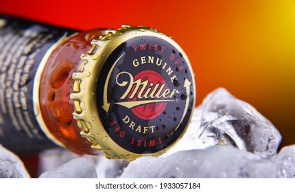POZNAN, POL - FEB 25, 2021: Crown cap on a Miller Genuine Draft bottle, the original cold filtered packaged draft beer, a product of the Miller Brewing Company owned by SABMiller