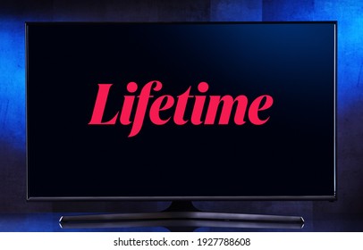 POZNAN, POL - FEB 6, 2021: Flat-screen TV set displaying logo of Lifetime, an American basic cable channel that is part of Lifetime Entertainment Services, a subsidiary of A and E Networks