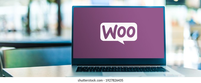 POZNAN, POL - FEB 6, 2021: Laptop computer displaying logo of WooCommerce, an open-source e-commerce plugin for WordPress