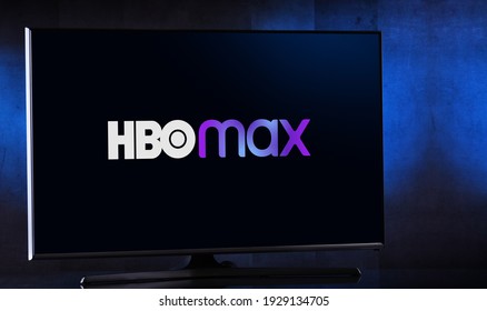 POZNAN, POL - FEB 6, 2021: Flat-screen TV set displaying logo of HBO Max, an American subscription video on demand streaming service owned by AT and T