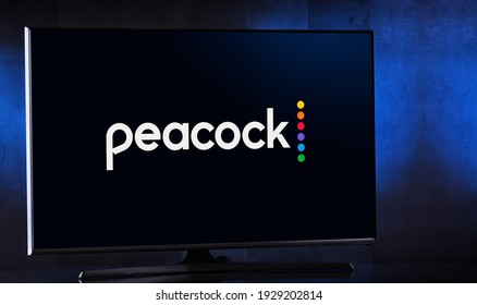 POZNAN, POL - FEB 6, 2021: Flat-screen TV set displaying logo of of Peacock, an over-the-top video streaming service owned and operated by the Television and Streaming division of NBCUniversal