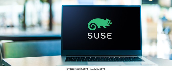 POZNAN, POL - FEB 6, 2021: Laptop Computer Displaying Logo Of SUSE, A German-based, Multinational, Open-source Software Company That Develops And Sells Linux Products To Business Customers