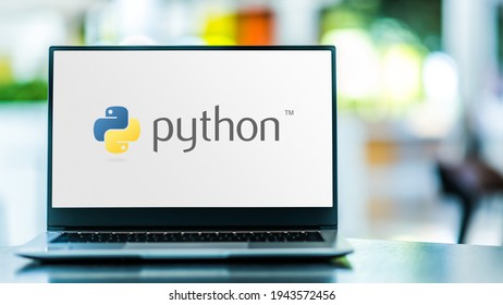 POZNAN, POL - FEB 6, 2021: Laptop computer displaying logo of Python interpreted, high-level and general-purpose programming language