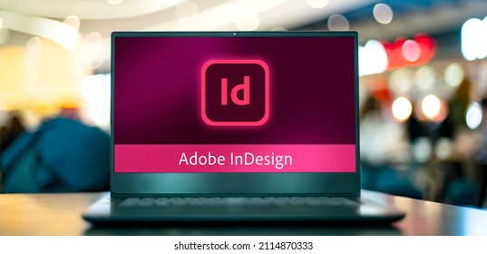 POZNAN, POL - JAN 16, 2022: Laptop computer displaying logo of Adobe InDesign, a desktop publishing and typesetting software application produced by Adobe Systems