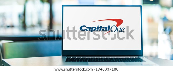 POZNAN, POL - JAN 6, 2021: Laptop computer\
displaying logo of Capital One Financial Corporation, a bank\
holding company specializing in credit cards, auto loans, banking,\
and savings accounts.