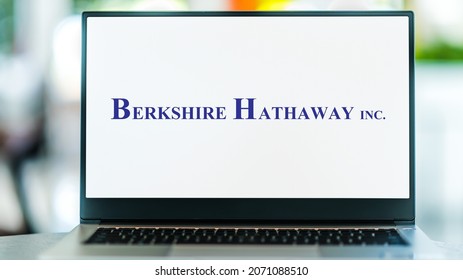 POZNAN, POL - JUL 3, 2021: Laptop computer displaying logo of Berkshire Hathaway Inc., an American multinational conglomerate holding company headquartered in Omaha, Nebraska, USA